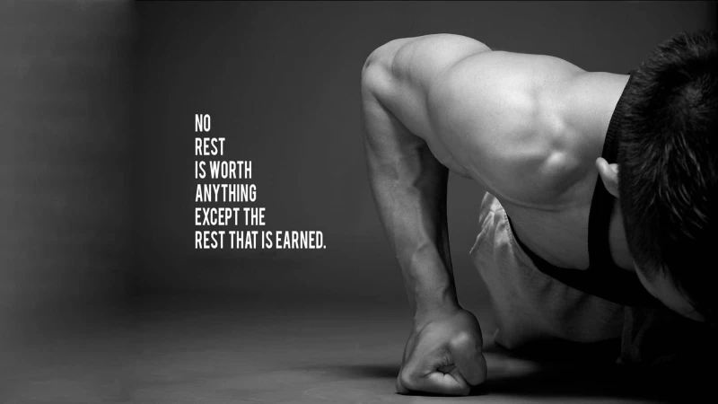 planking man with fitness quote