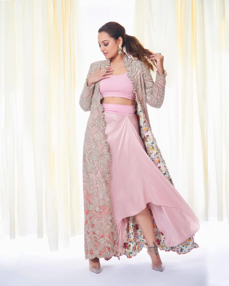 Sonakshi Sinha cuts a striking figure in a pink skirt set with an embellished jacket