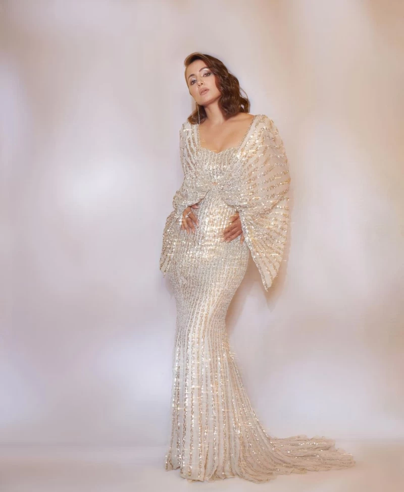 Hina Khan Looks Ravishing In White Shimmering Bodycon Gown