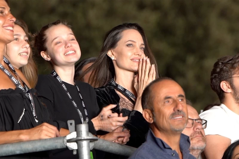 CONTENTED CONCERT: When in Rome, Angelina Jolie (right) and Shiloh Jolie-Pitt enjoy some mother-daughter time at a MÃ¥neskin concert.