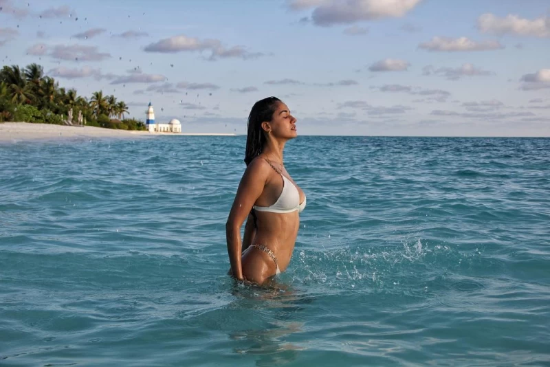 Disha Patani proves she is a water baby with her latest sizzling bikini photo on Instagram. The actress is looking hot as hell in the white bikini.