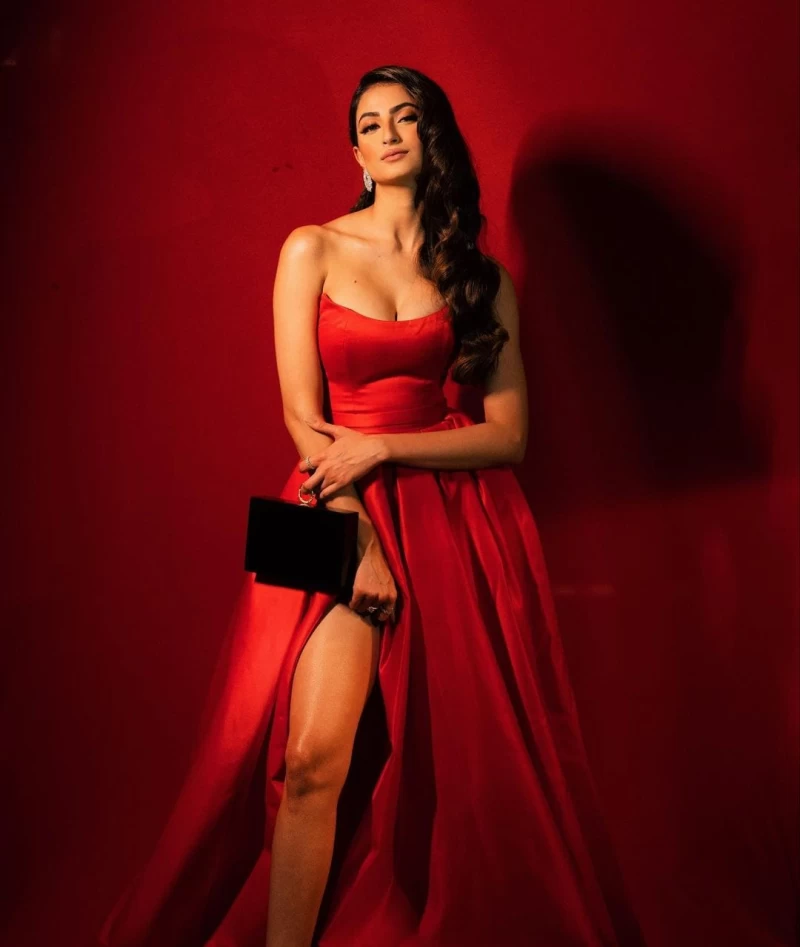 Palak Tiwari cuts a statusque figure in the red dress with a thigh-high slit