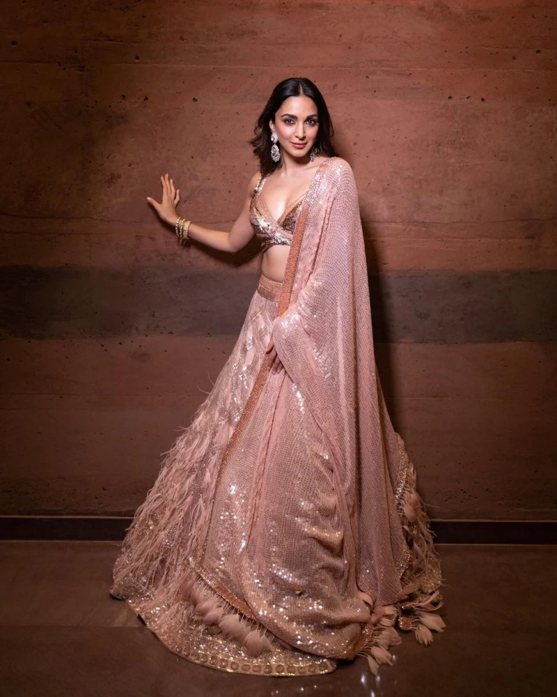 Kiara Advani shimmers in a shiny pastel pink lehenga