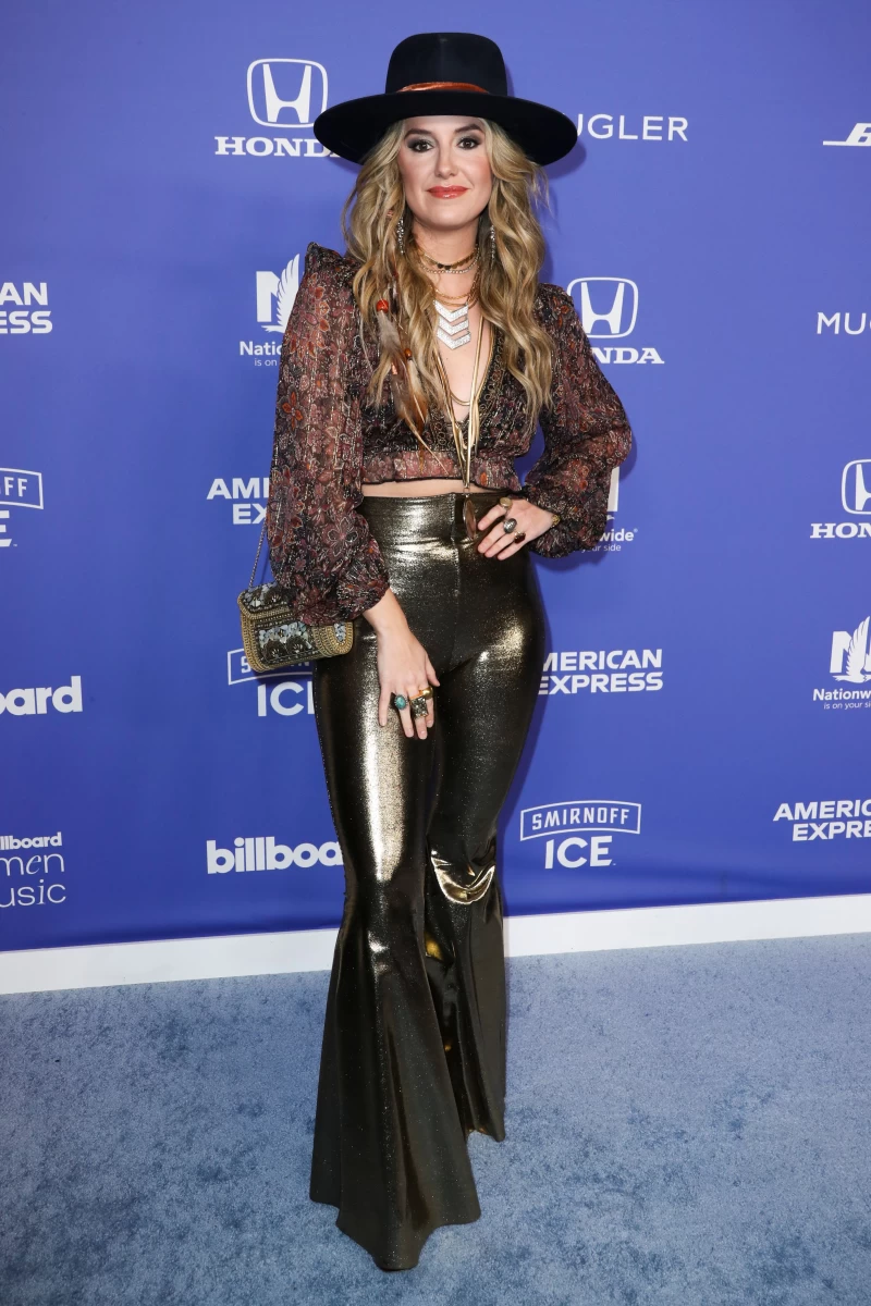 Lainey Wilson on the Billboard Women in Music Awards 2023 red carpet.