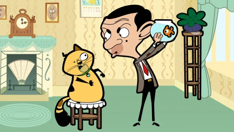 A Mr. Bean 4K wallpaper of cartoon Mr. Bean holding up a fishbowl with his goldfish away from a yellow, one-eyed cat that is standing on a stool.