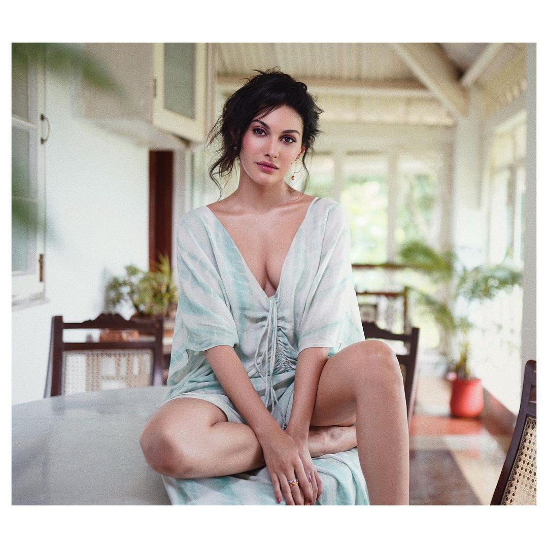 Amyra Dastur looks sexy in the dress with a plunging neckline
