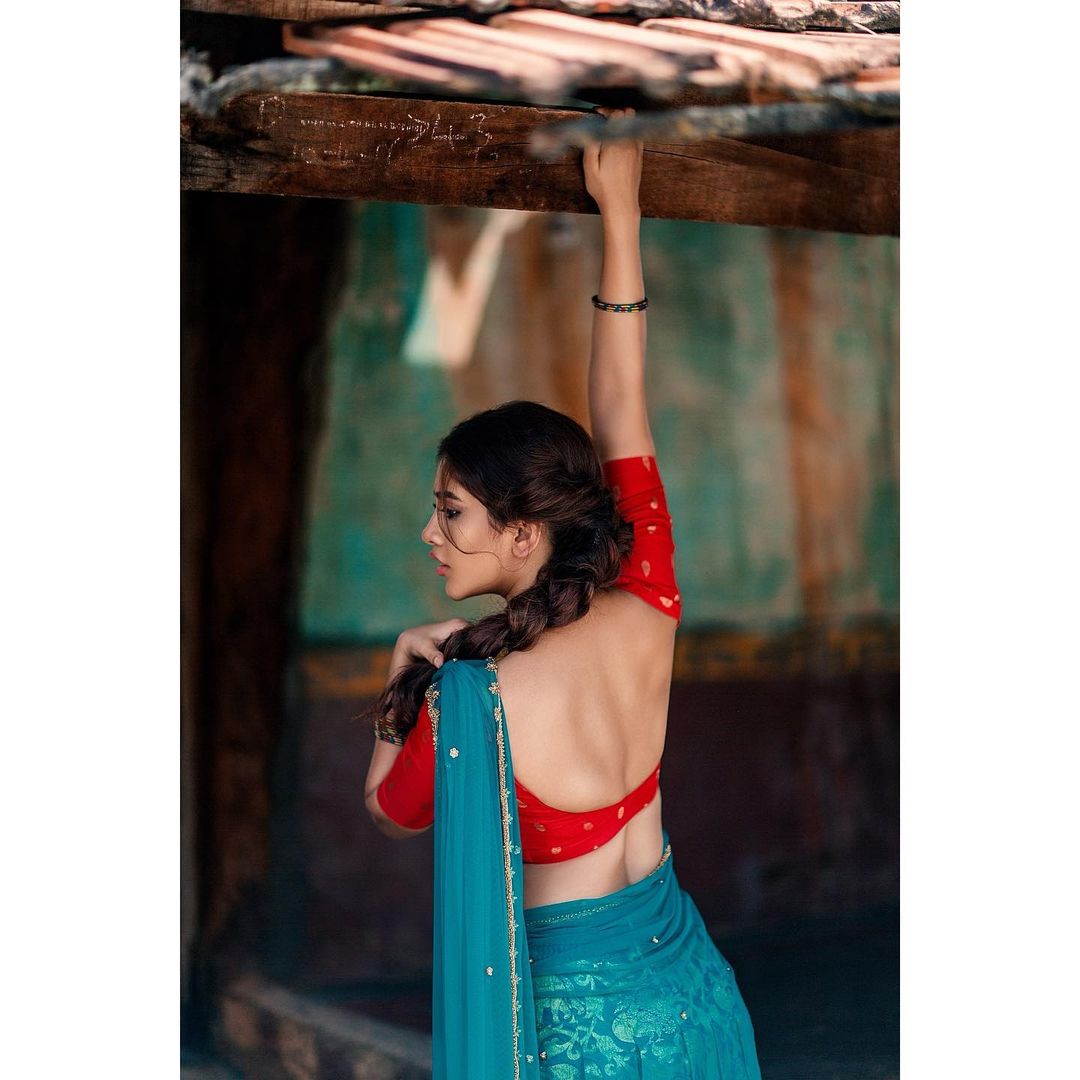 Nabha Natesh Sizzles In Red And Blue Half Saree! Photo