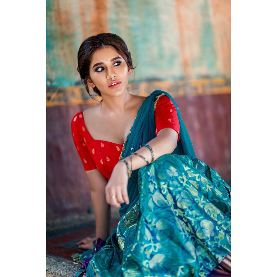 Nabha Natesh Sizzles In Red And Blue Half Saree! Photo