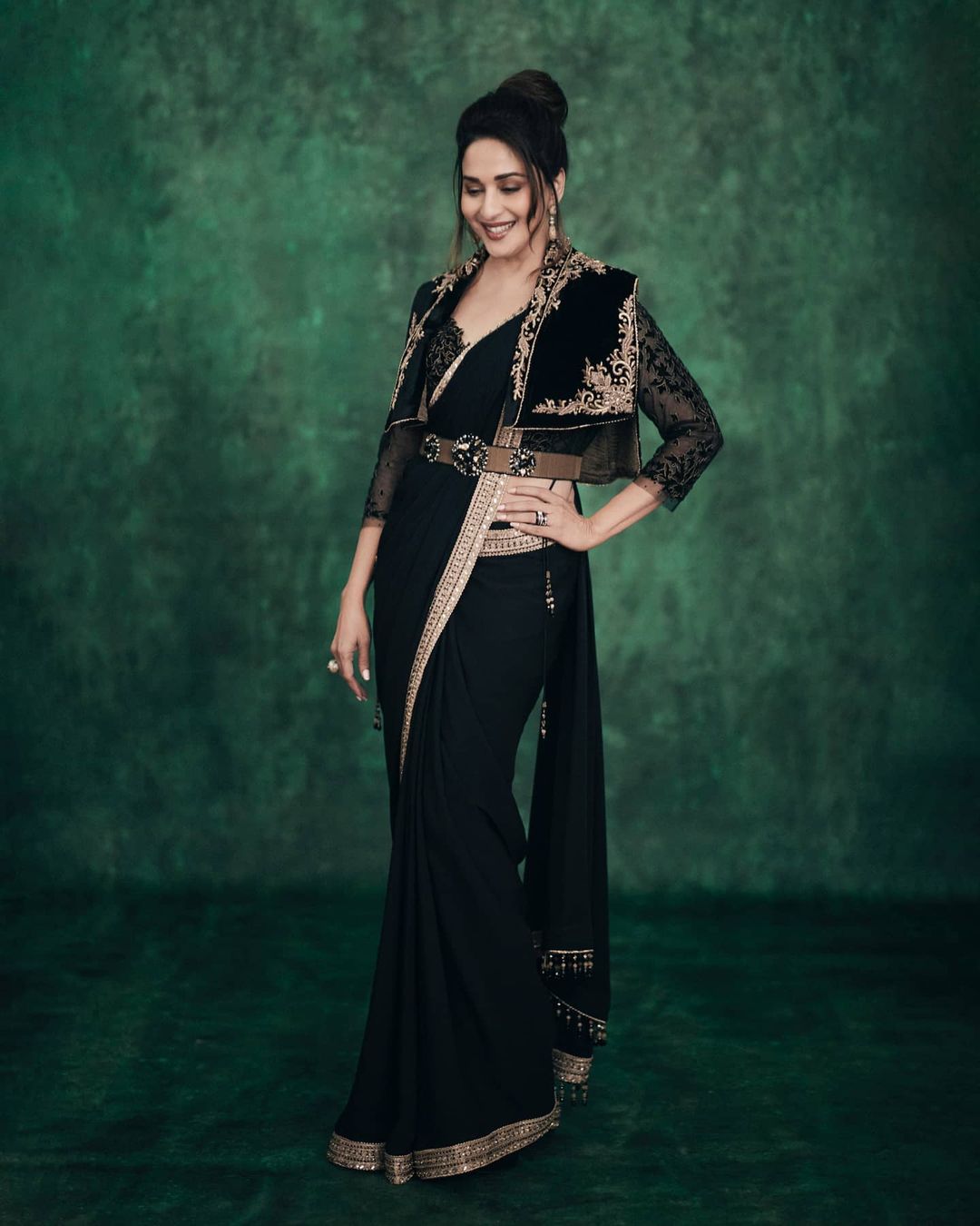 Madhuri Dixit Nene works her charm in the belted saree with a short jacket