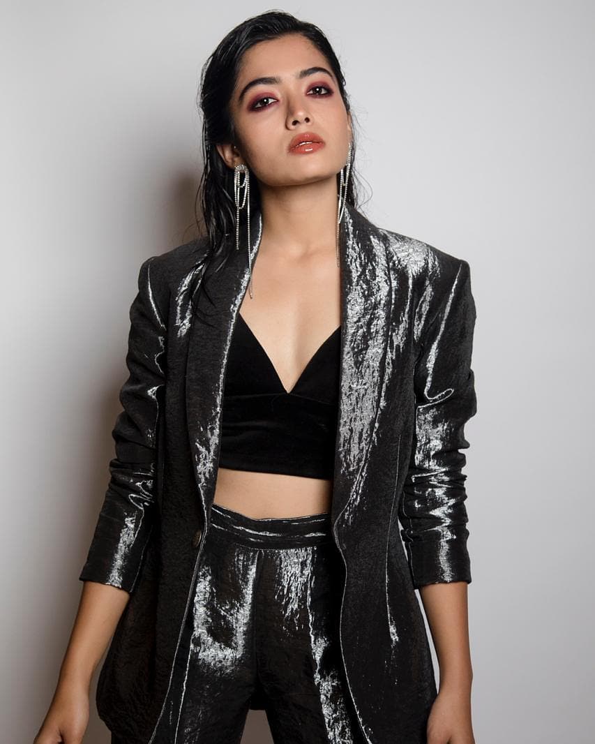 Rashmika Madanna looks sexy in a shimmery co-ord set and a deep neckline blouse.
