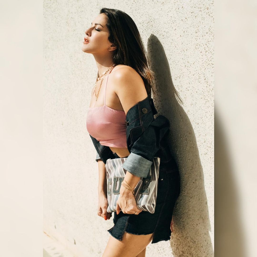 Sunny Leone looks uber hot in a mini skirt and a strappy top