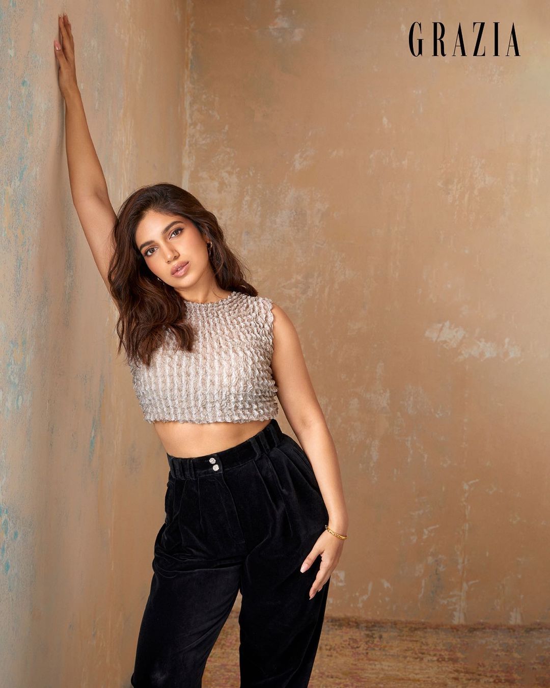 Bhumi Pednekar strikes a pose in the crop top and trousers.