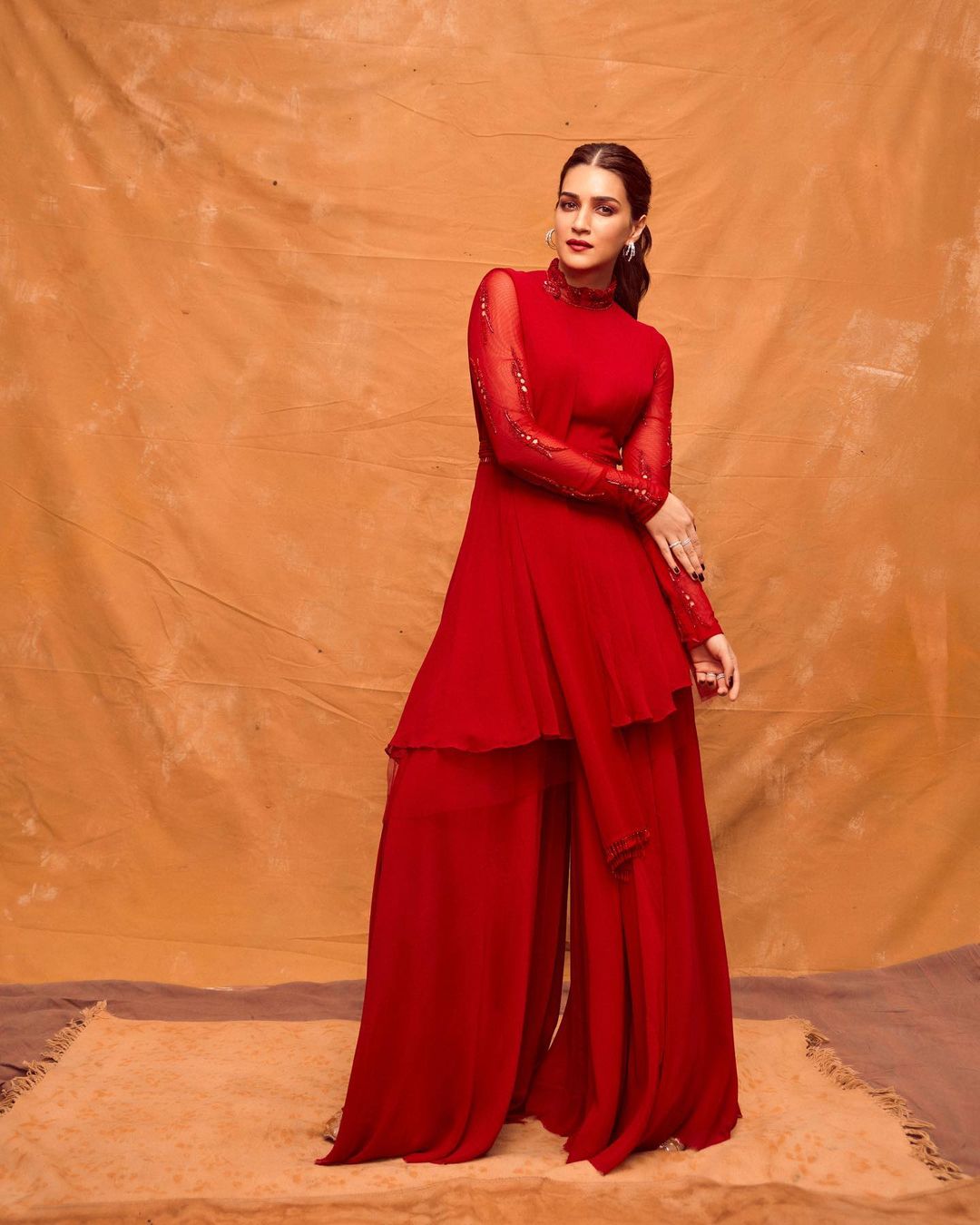Kriti Sanon cuts a statusque figure in an all-red ensemble.