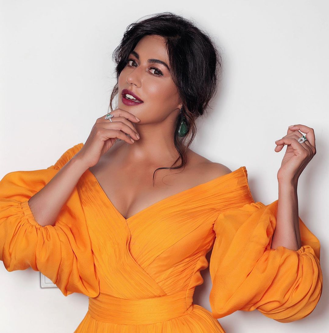 Chitrangda Singh looks uber hot in a mustard yellow dress with fluffy sleeves