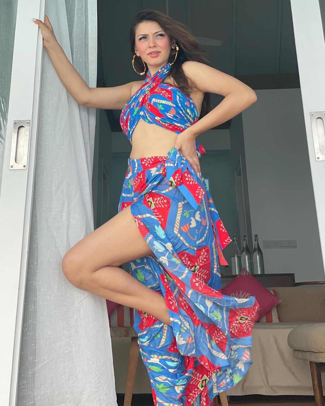 Hansika Motwani looks sensuous in the multicoloured resort dress