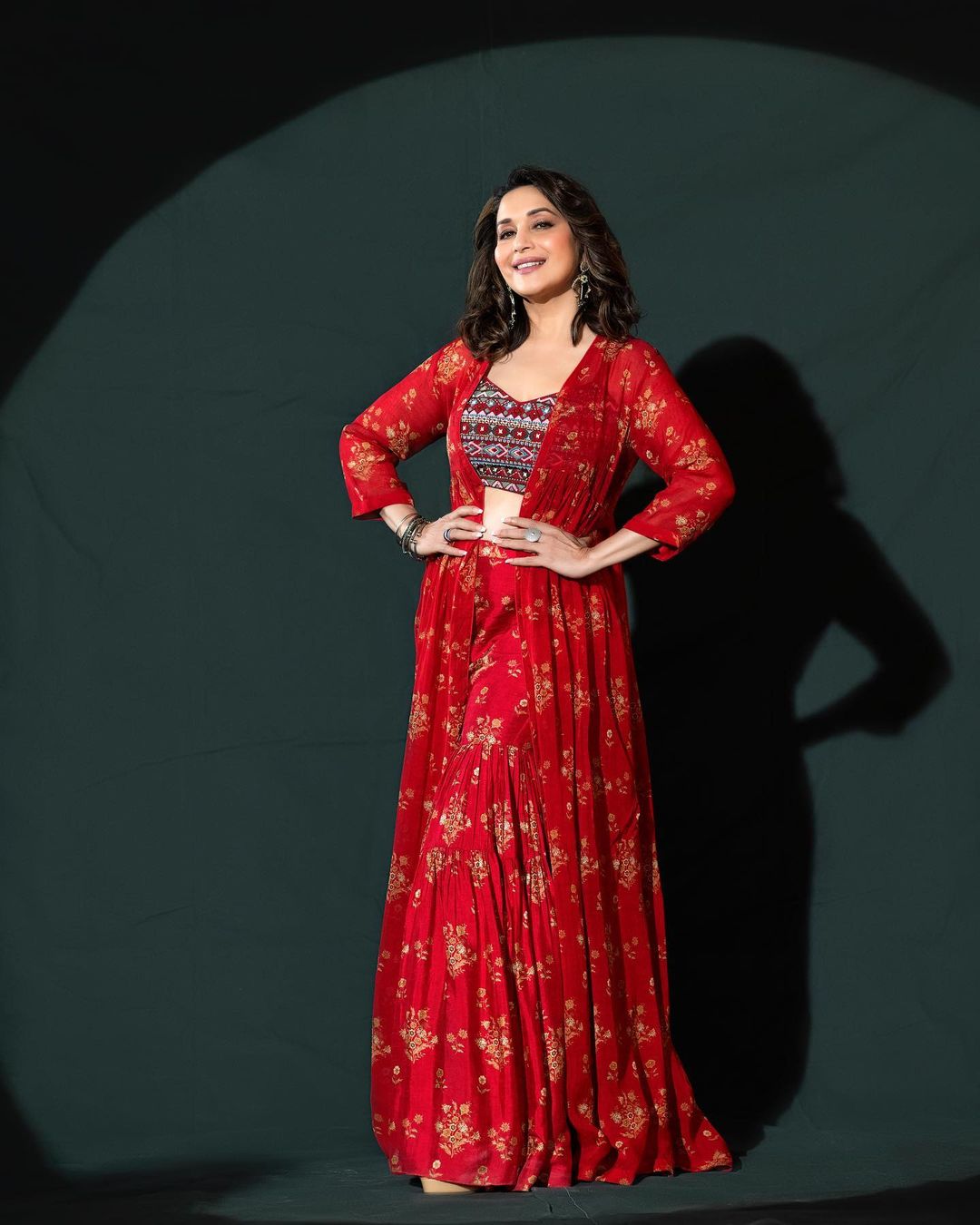 Madhuri Dixit Nene looks graceful in the red floral ethnic dress