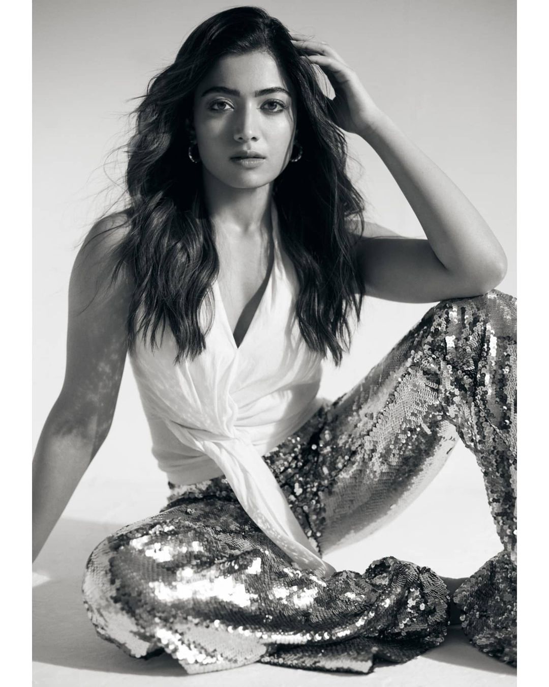 Rashmika Mandanna looks stunning in the tie-up top and sequinned pants