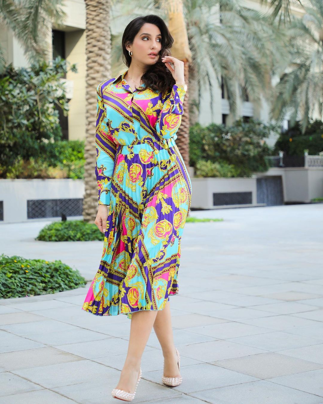 Nora Fatehi is a striking sight in the colourful pleated outfit