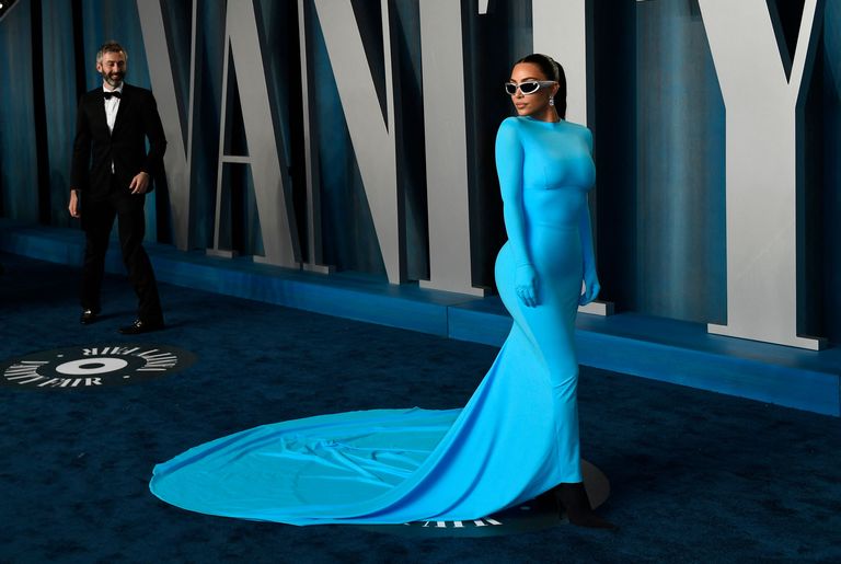 Kim Kardashian Hits the Vanity Fair Oscars Party in Skin-Tight Blue Gown