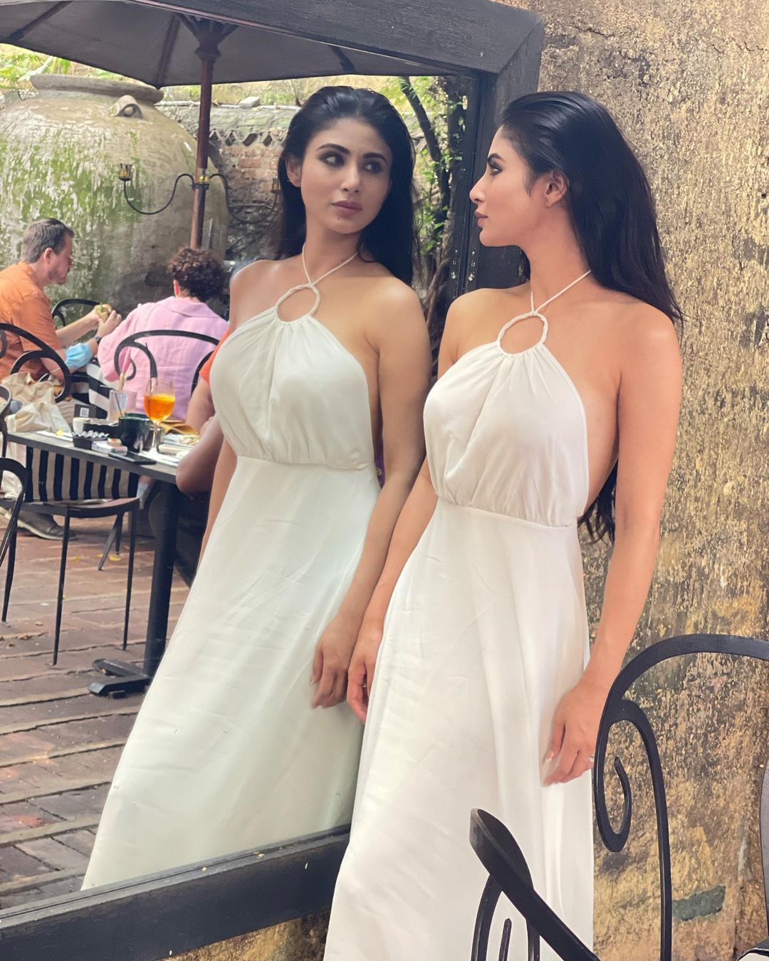 Mouni Roy looks breathtaking in the white backless dress