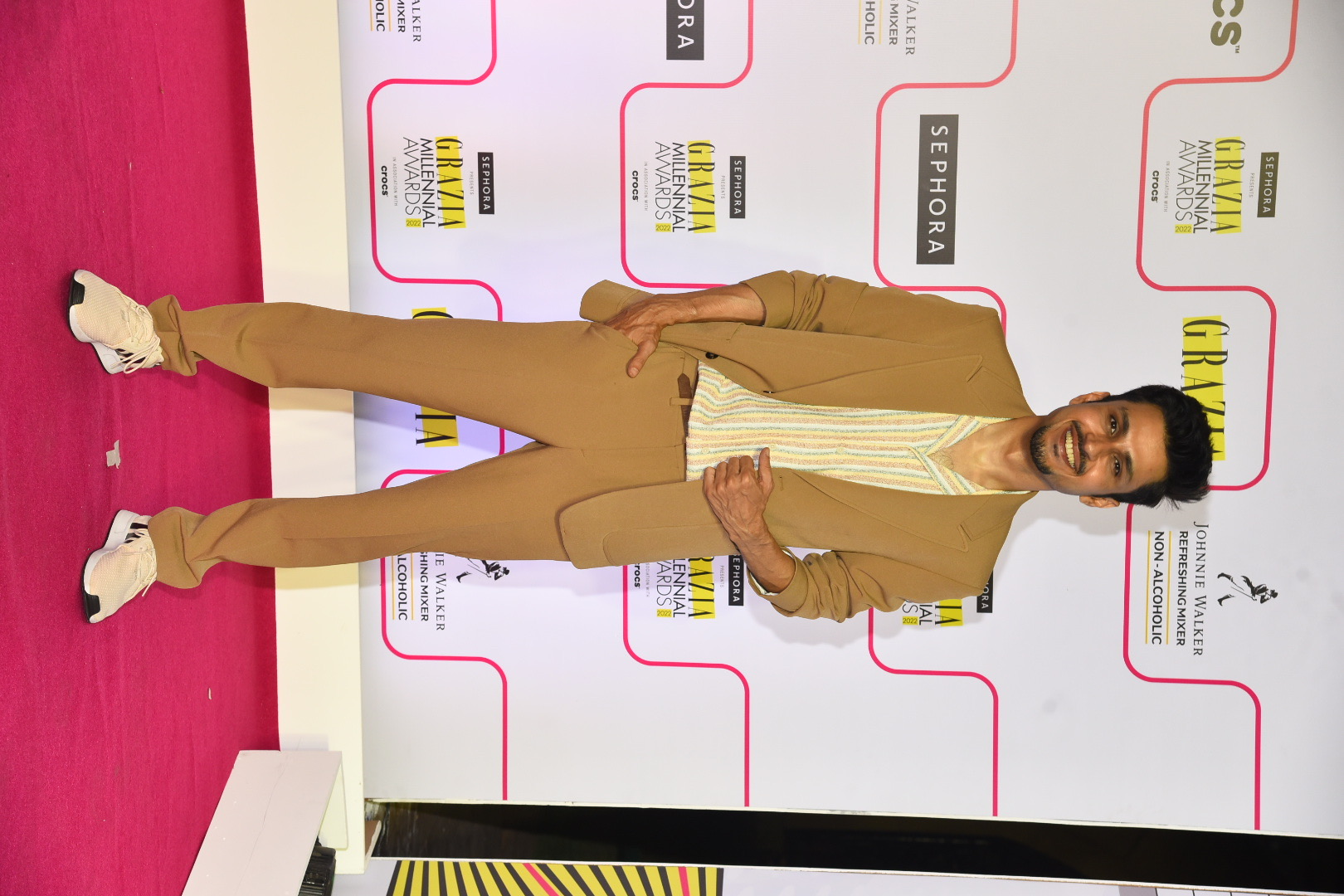 Amol Parashar keeps it smart in the brown suit.