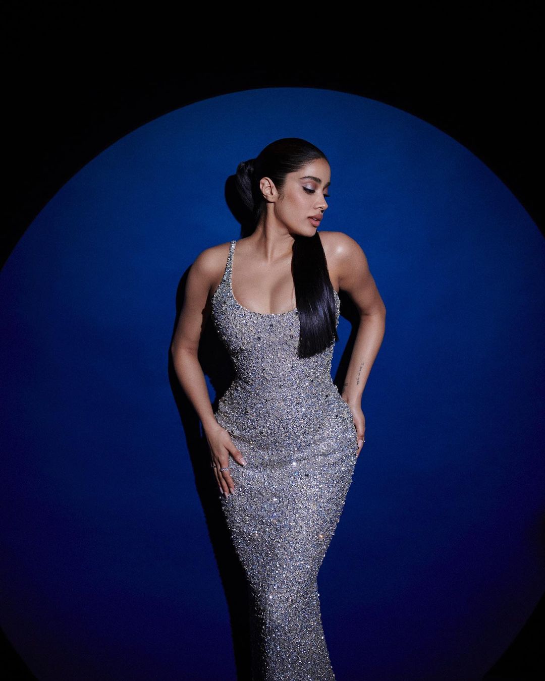 Janhvi Kapoor looks stunning in the sequinned dress with a plunging neckline