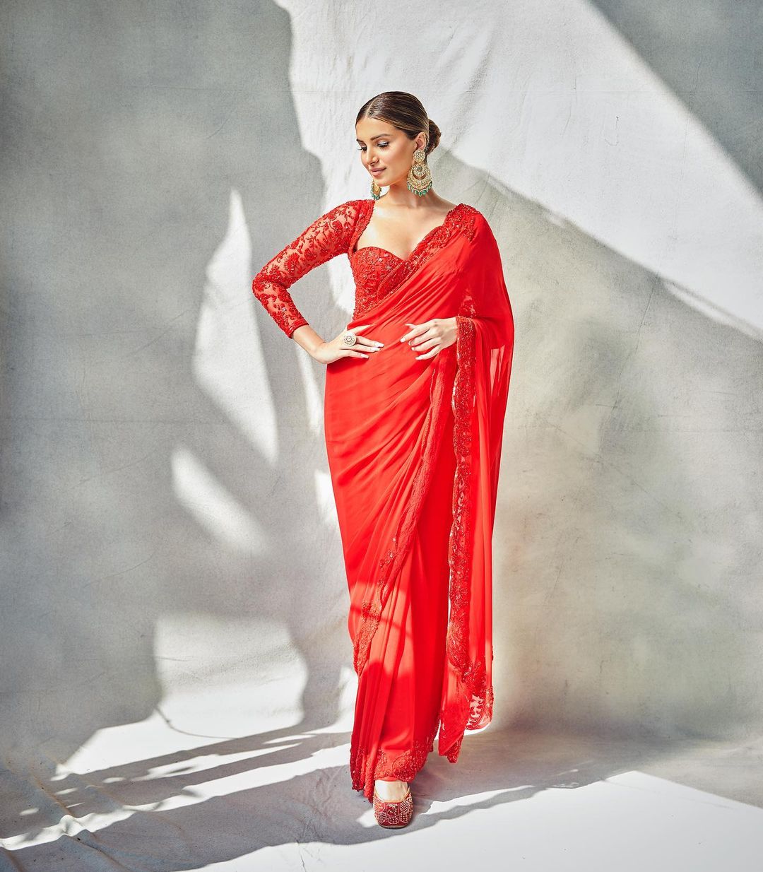 Tara Sutaria Is A Picture Of Elegance In Red Saree