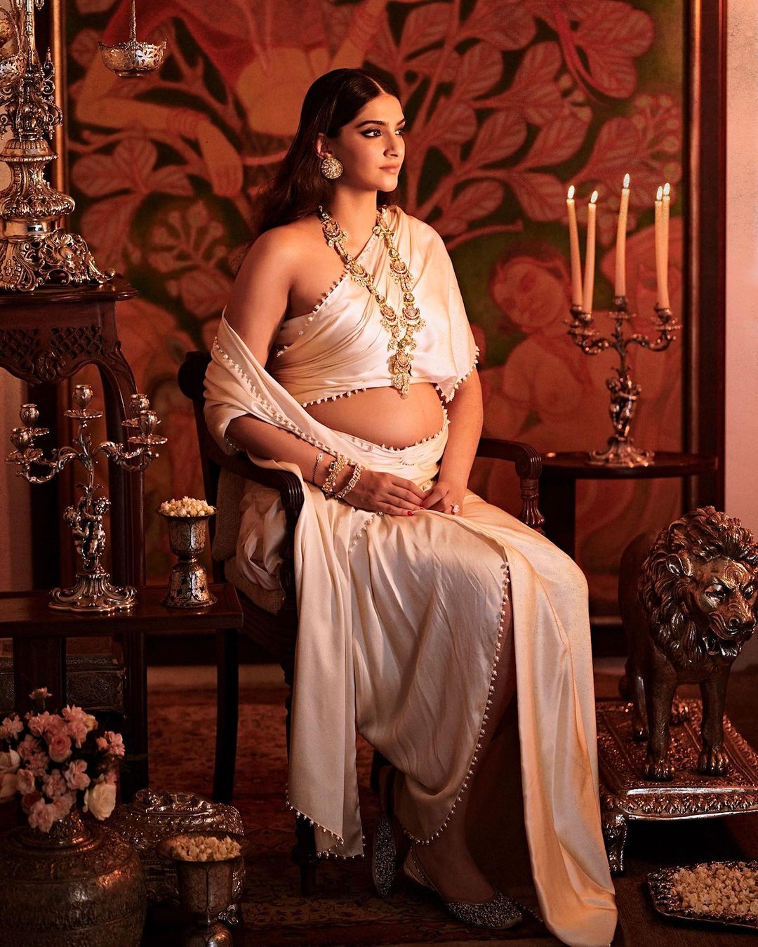 Sonam Kapoor looks straight out of a painting draped in an ivory saree