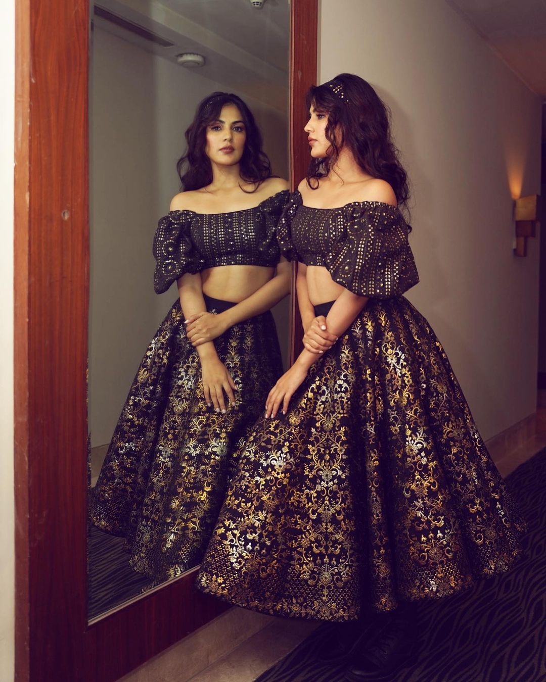 Rhea Chakraborty is a sight to behold in a shimmering black and gold lehenga