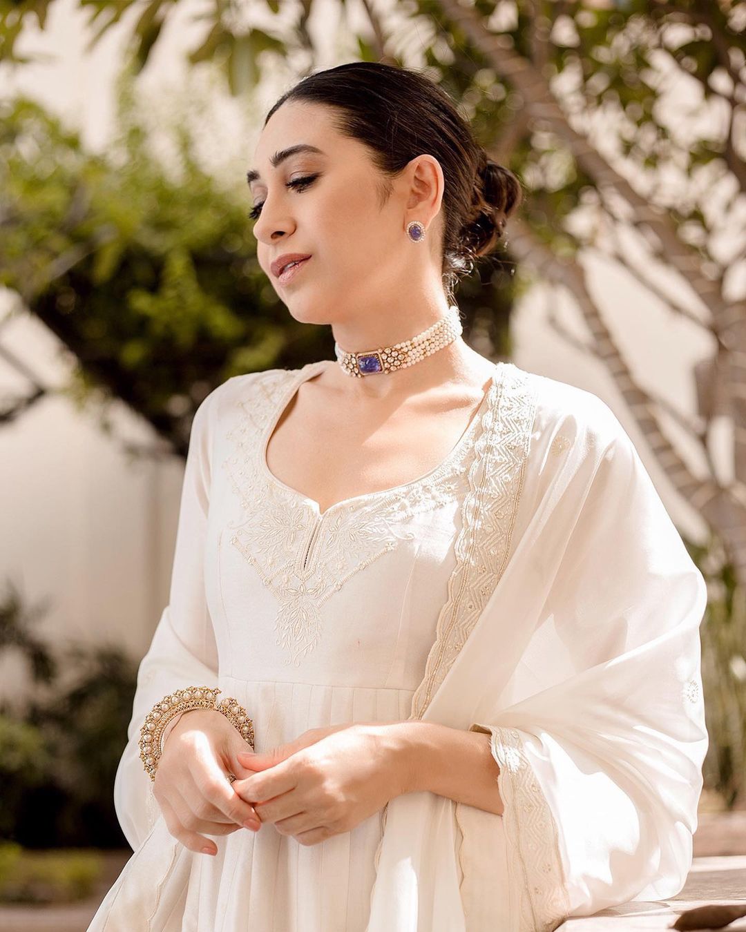 Karisma Kapoor looks breathtaking in a pristine white anarkali