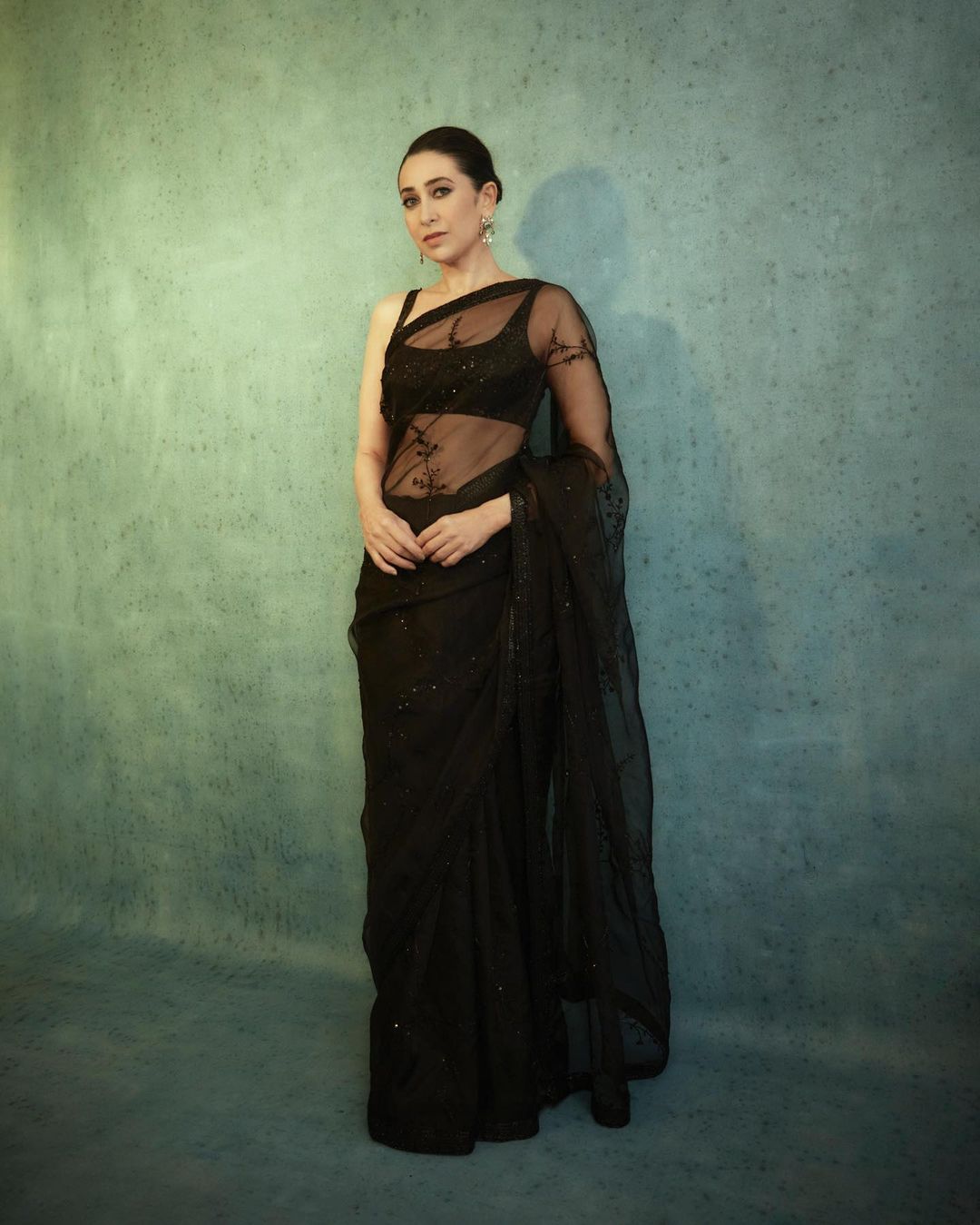 Karisma Kapoor looks divine draped in the black sheer saree