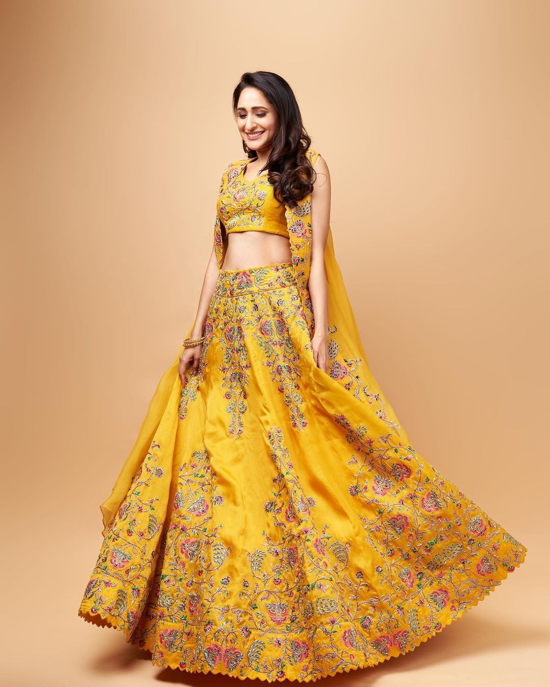 Pragya Jaiswal looks graceful in the yellow lehenga