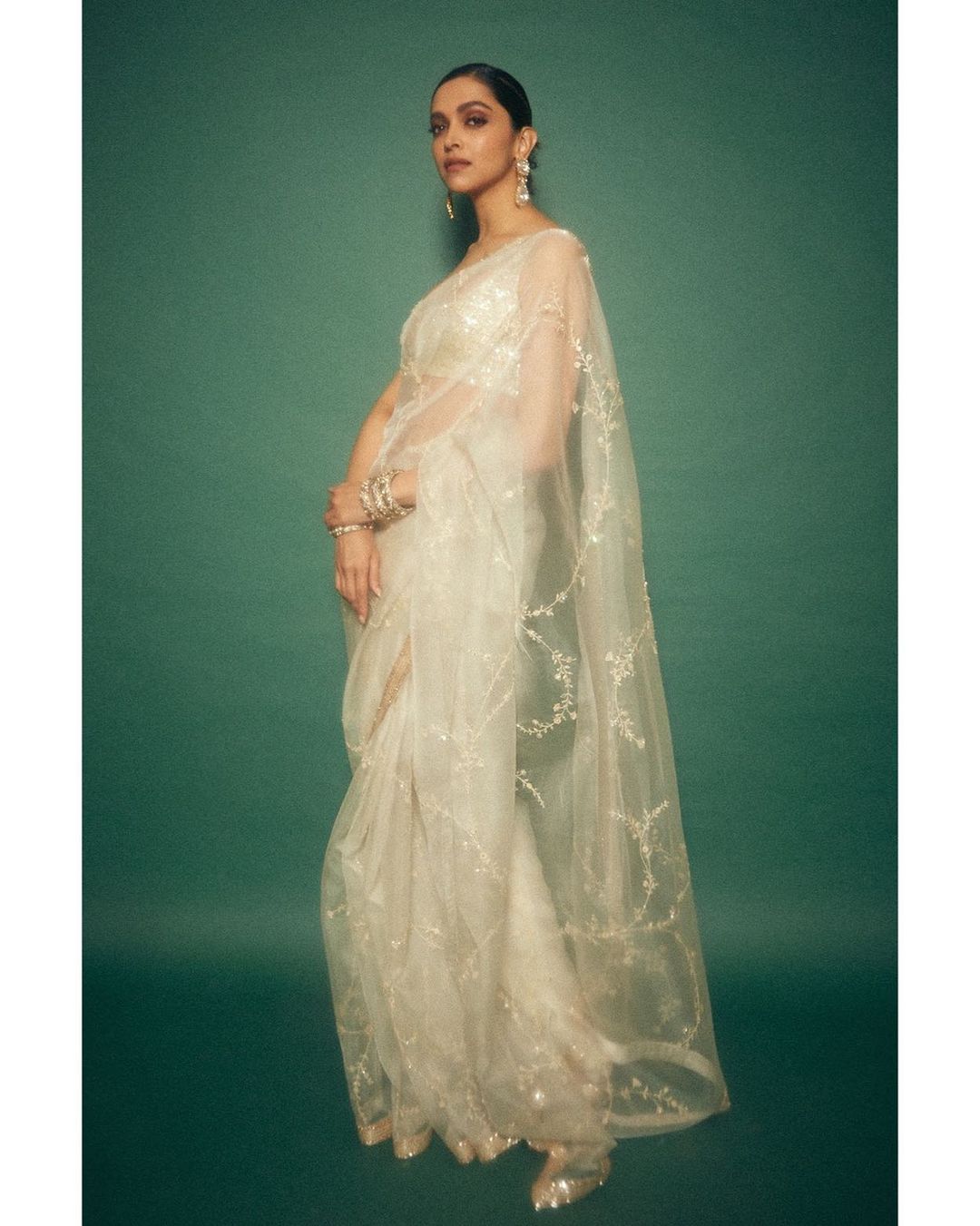 Deepika Padukone in the sheer white embroidered saree in a vision to behold.