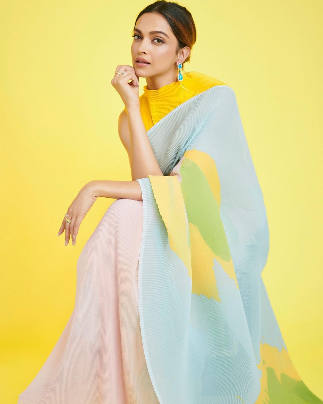 Deepika Padukone looks fresh in the pastel-coloured pleated saree
