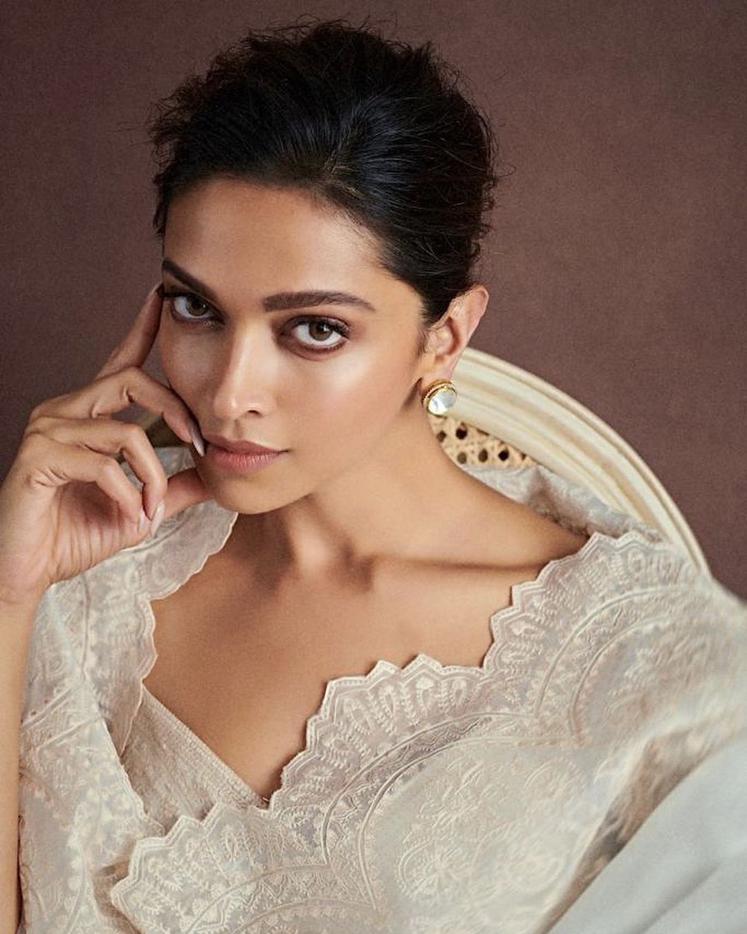 Deepika Padukone paints a regal picture in an ivory saree