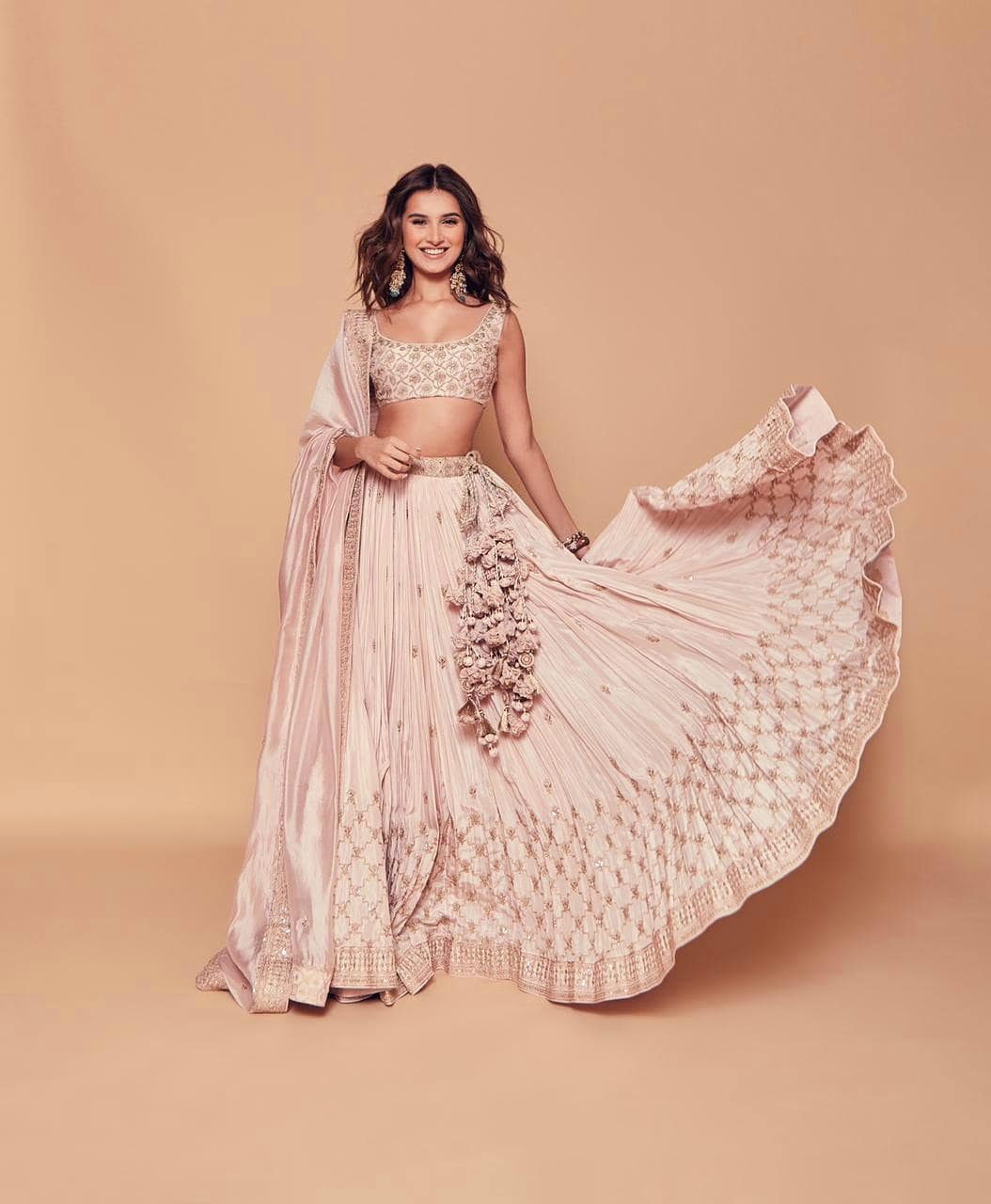 Tara Sutaria is a sight to behold in the pastel pink lehenga