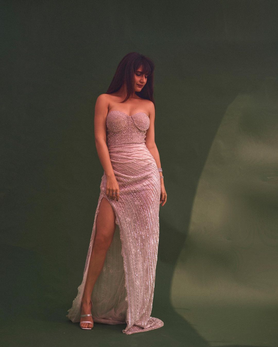 Fatima Sana Shaikh strikes a pose in the gown with a thigh-high slit