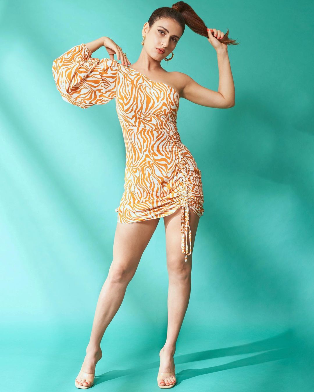 Fatima Sana Shaikh is giving summer fashion goals in an orange asymmetrical dress