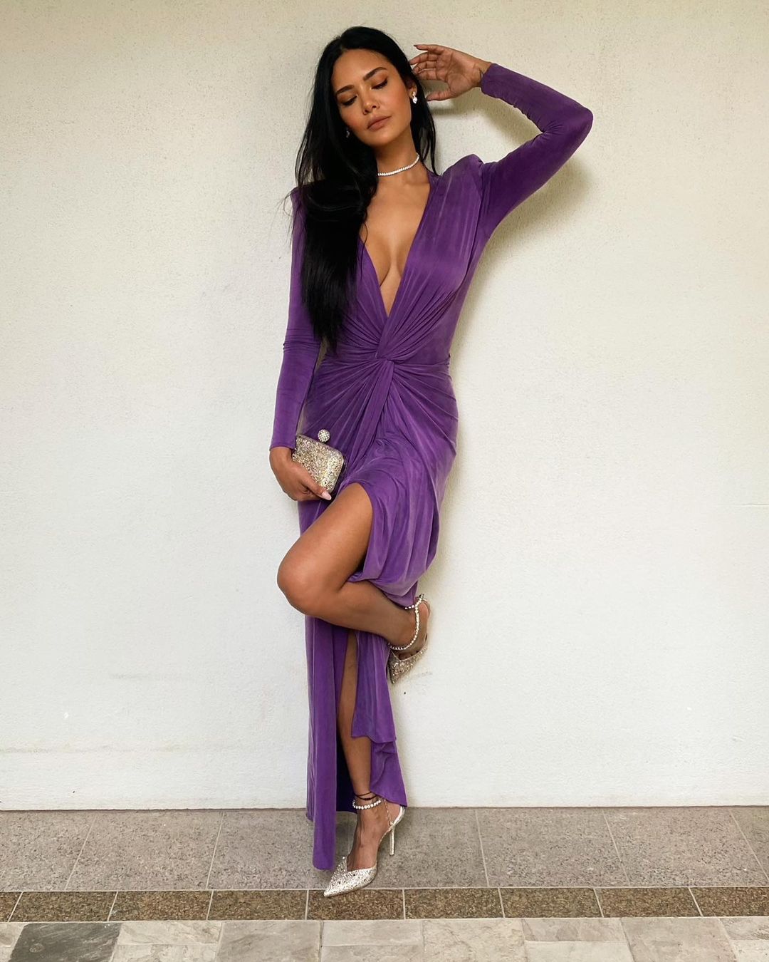 Esha Gupta flaunts her curves in the purple pleated dress