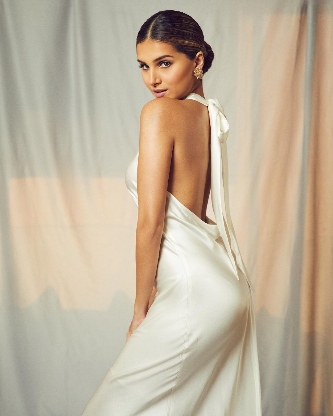 Tara Sutaria looks super sexy in the white satin dress