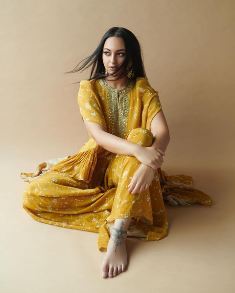 Sonakshi Sinha strikes a pose in the mustard yellow ethnic suit