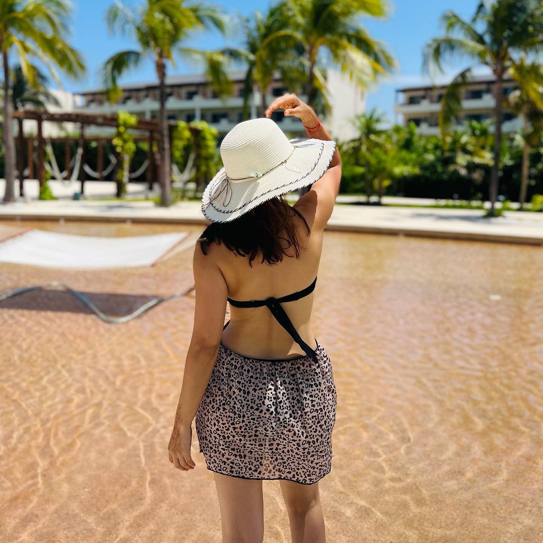 Sonalee looks hot and chic in this backless dress on her tropical vacation with her husband Kunal Benodekar