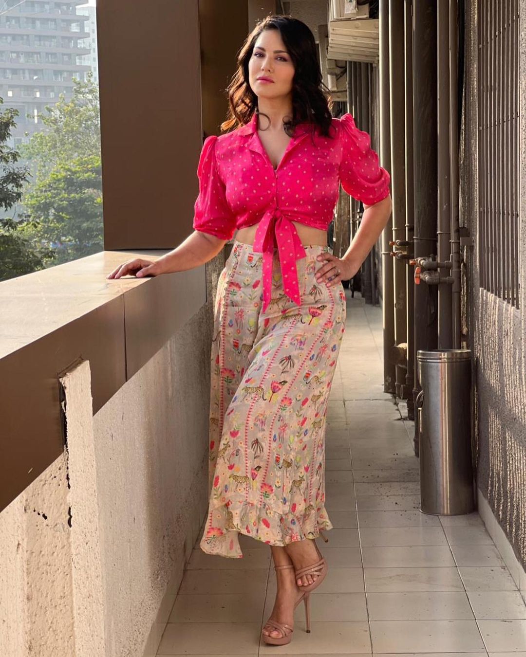 Sunny Leone looks stunning in the crop top and floral midi skirt