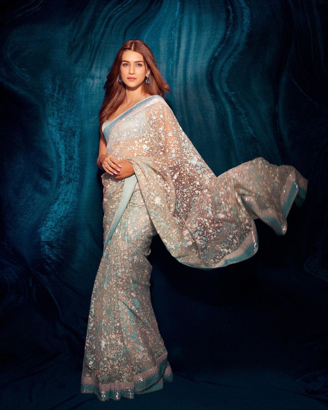 Kriti Sanon looks graceful in the blue and white saree