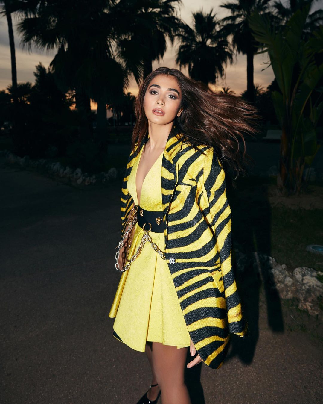 Pooja Hegde looks gorgeous in the yellow dress with the tiger-striped blazer