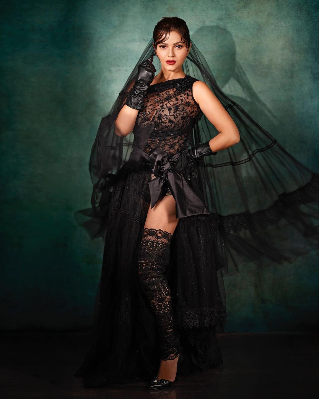 Rubina Dilaik oozed glamour in the semi-sheer black look, complete with gloves and a veil.