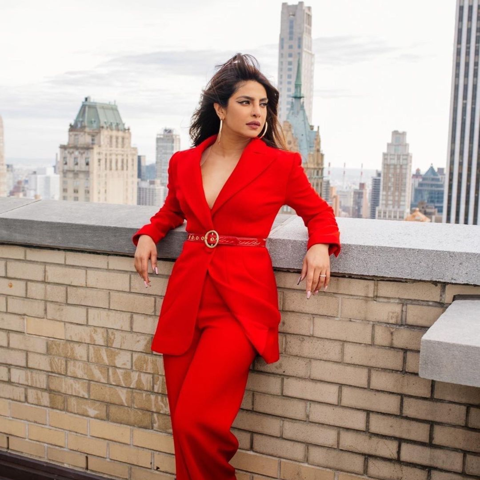 Priyanka Chopra looks uber chic in the smart red pantsuit