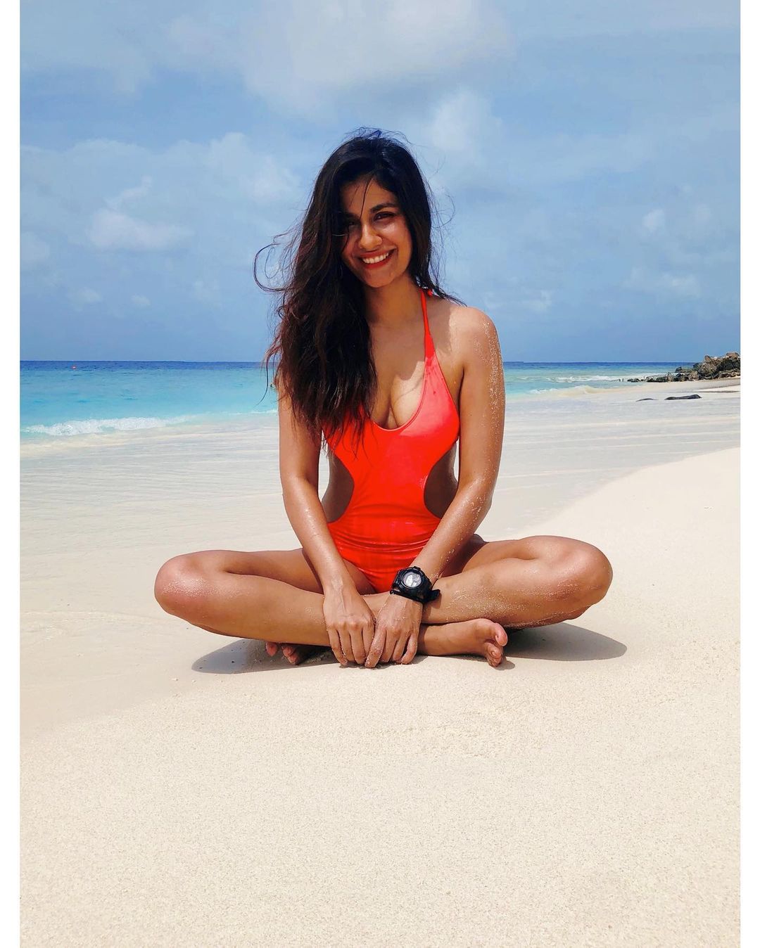 Shreya Dhanwanthary looks pretty as she poses on the white beach