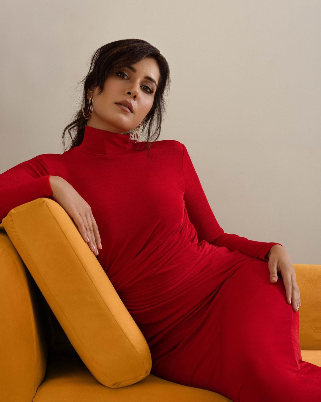 Raashii Khanna looks chic in the body-hugging red dress.