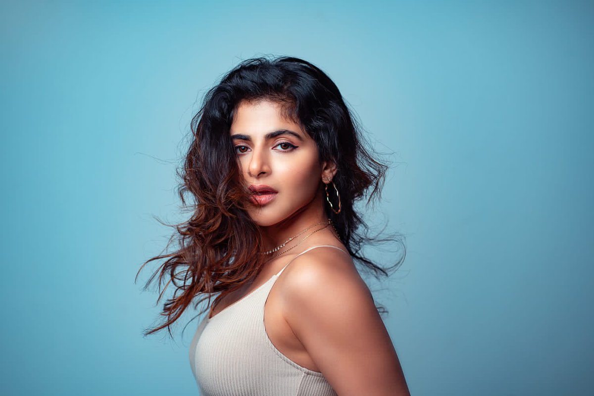 Stunner Iswarya menon stuns in a classic white suit